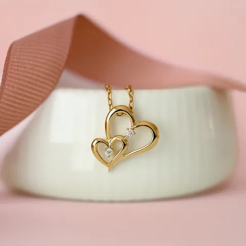 hjärta hängen i 14 carat guld 0,06 ct