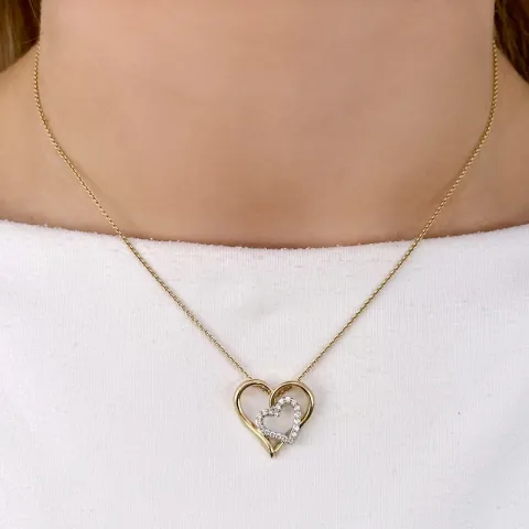 hjärta diamantberlocker i 14  carat guld- och vitguld 0,16 ct