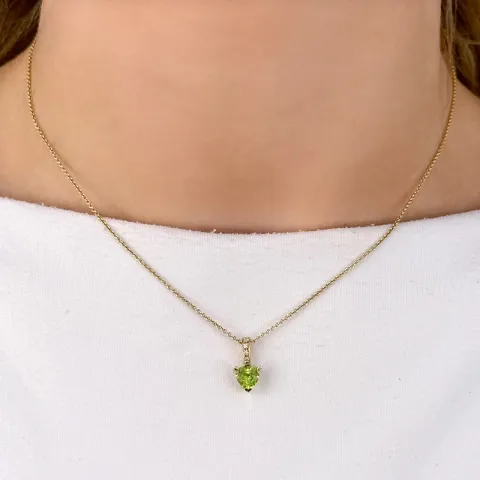 hjärta peridot hängen i 14  carat guld 0,03 ct 0,84 ct