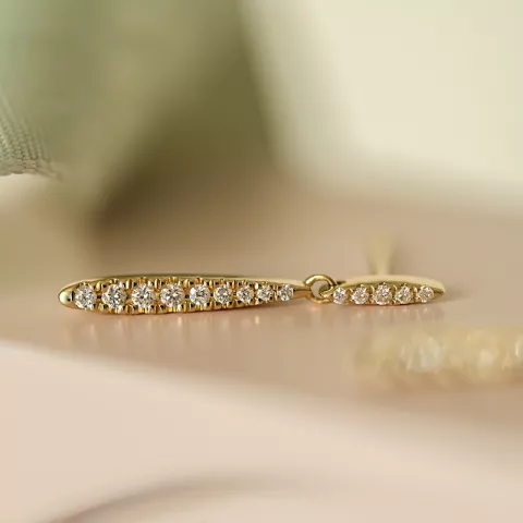 långa diamant örhängen i 14 karat guld med diamant 