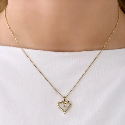 hjärta diamantberlocker i 14 carat guld 0,017 ct