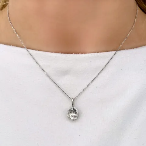 ovalt kvarts diamantberlocker i 14 carat vitguld 0,12 ct 2,0 ct