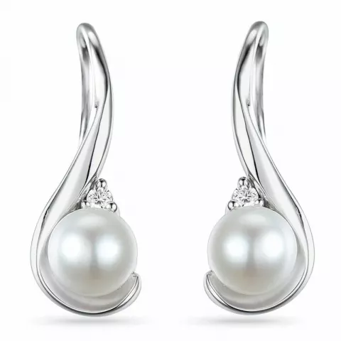 Vita pärla örhängen i 14 karat vitguld med diamanter 