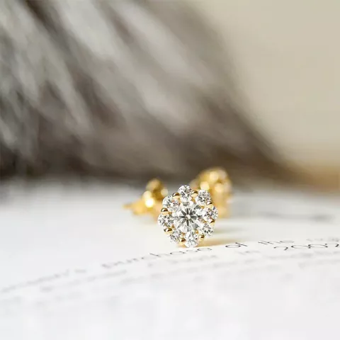 blommor diamant örhängestift i 14 karat guld med diamant 