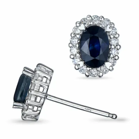 ovala safir örhängestift i 14 karat vitguld med diamant och safir