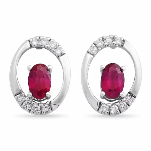 ovala rubin örhängestift i 14 karat vitguld med diamant och rubin