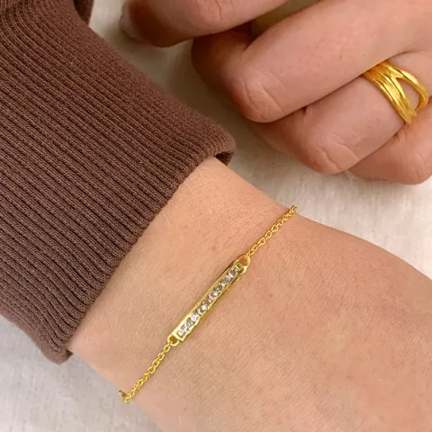 zirkon armband i förgyllt silver med hängen i förgyllt silver