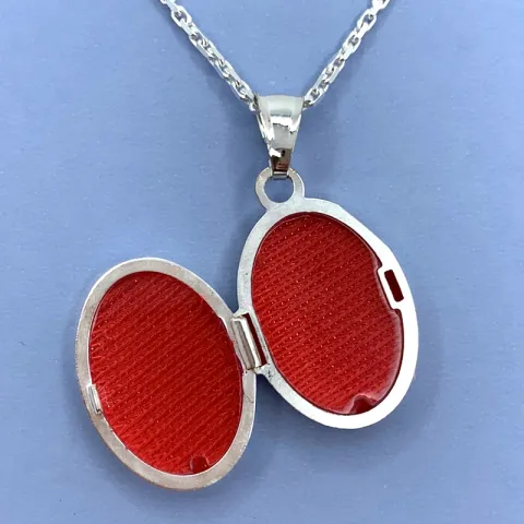 oval medaljong i silver