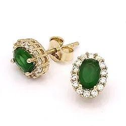 Ovala örhängestift i 14 karat guld med syntetisk smaragd och zirkoner