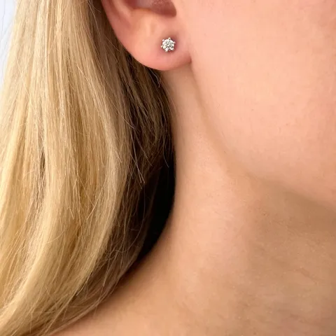 2 x 0,26 ct diamant solitäreörhängestift i 14 karat vitguld med diamant 