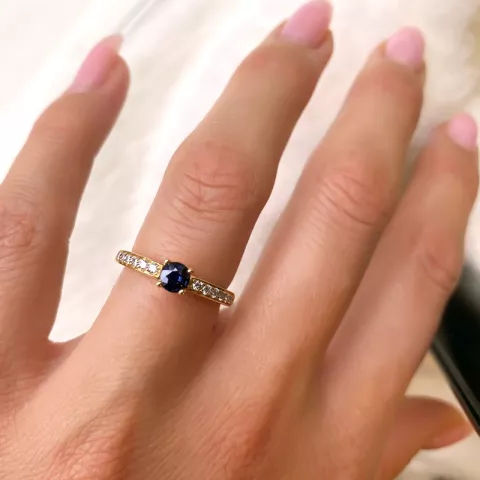 blå safir ring i 14  karat guld 0,20 ct 