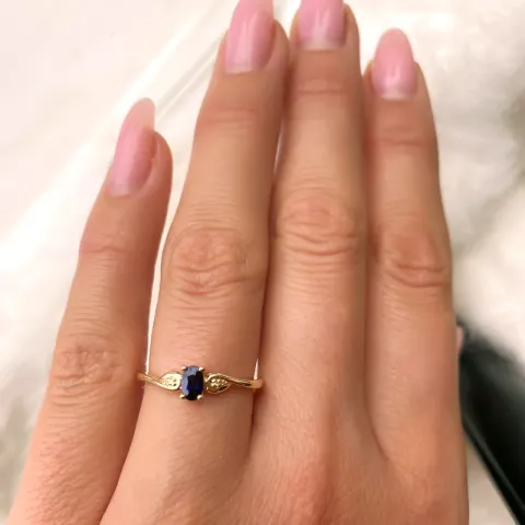 blå safir diamantring i 14  karat guld 0,008 ct 