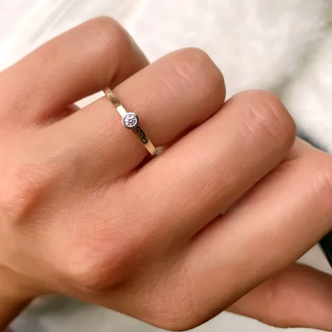 diamantring i 14 karat guld- och vitguld 0,05 ct