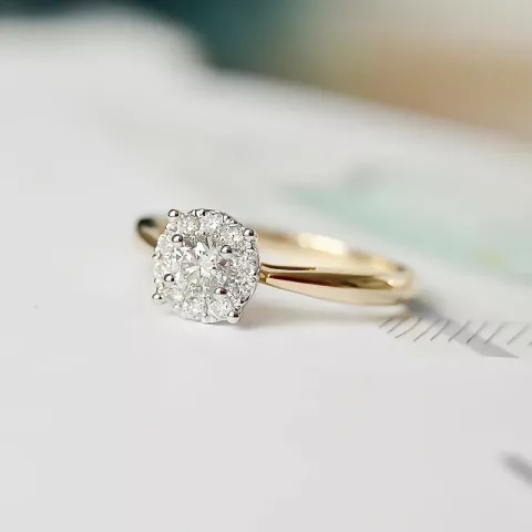 äkta  diamant ring i 14  karat guld- och vitguld 0,31 ct 0,22 ct