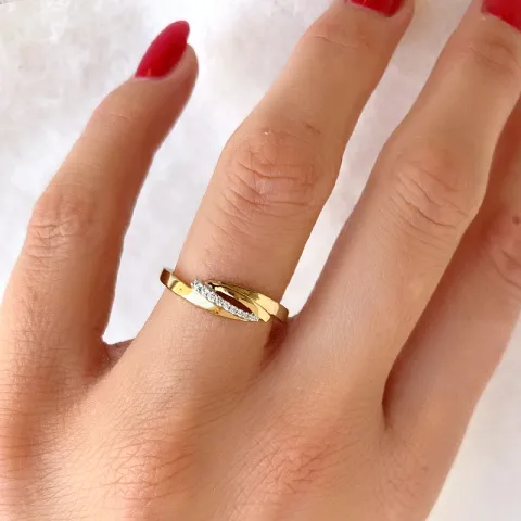 abstrakt diamantring i 14  karat guld- och vitguld 0,038 ct