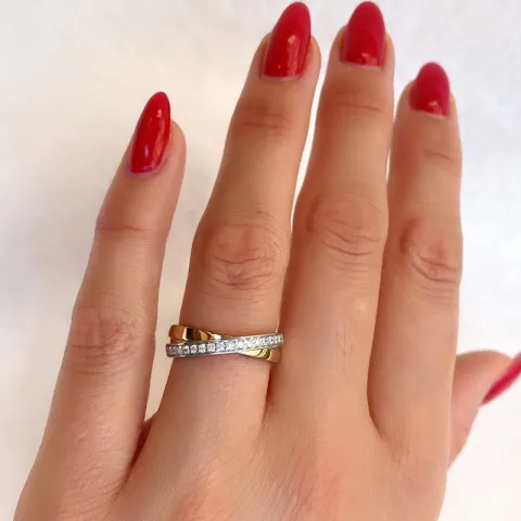 abstrakt diamant ring i 14 karat guld- och vitguld 0,201 ct