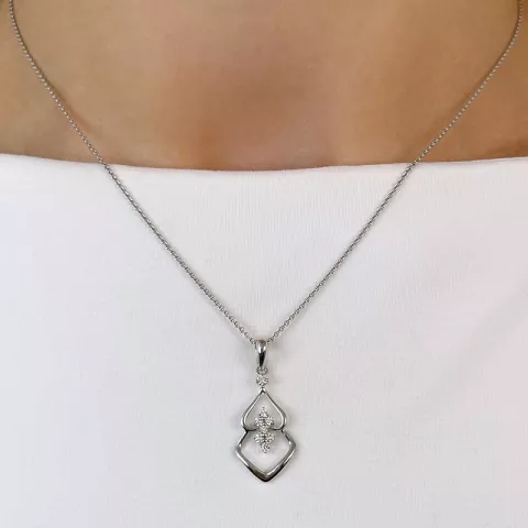 Trendig abstrakt diamantberlocker i 14  carat vitguld 0,18 ct