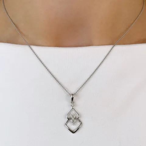 Trendig abstrakt diamantberlocker i 14 carat vitguld 0,18 ct