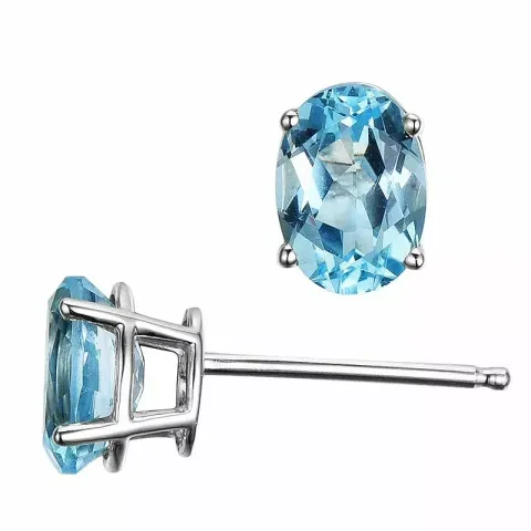 2 x 0,92 ct ovala topas örhängestift i 14 karat vitguld med topas