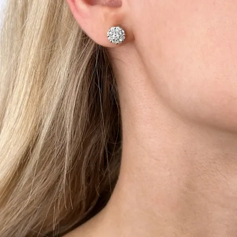 runda briljiantöronringar i 14 karat vitguld med diamant och diamant