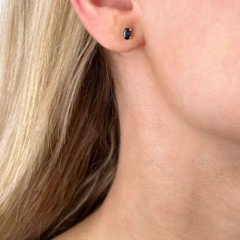 2 x 0,35 ct blå safir örhängestift i 14 karat guld med safir
