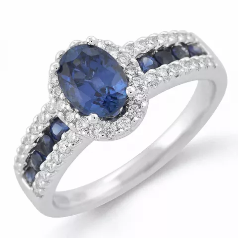 oval blå safir diamantring i 14  karat vitguld 0,286 ct 