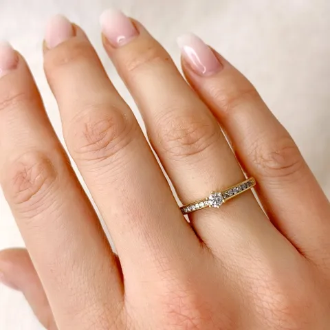 vit diamant guld ring i 14  karat guld 0,14 ct 0,08 ct