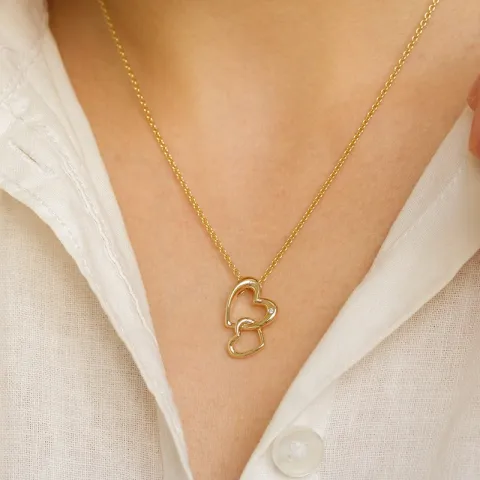 hjärta diamantberlocker i 14  carat guld 0,01 ct