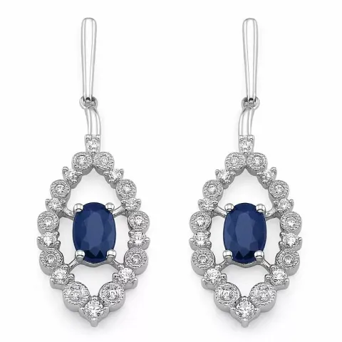 ovala blå safir briljiantöronringar i 14 karat vitguld med diamant och safir