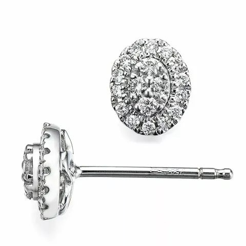 ovala diamantörhängen i 14 karat vitguld med diamant 