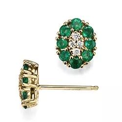 ovala smaragd diamantörhängen i 14 karat guld med smaragd och diamant 