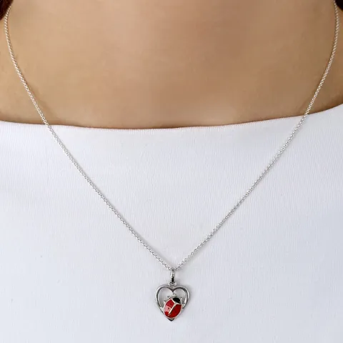 hjärta nyckelpiga hängen i silver