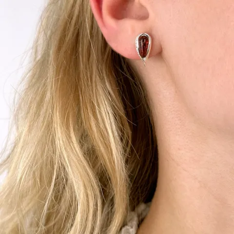 Droppformad abstrakt örhängestift i silver