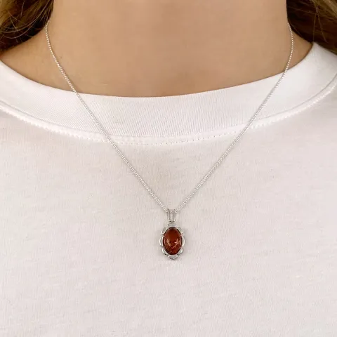 Ovalt blommor hängen i silver