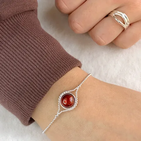 Runt bärnsten armband i silver med hängen i silver