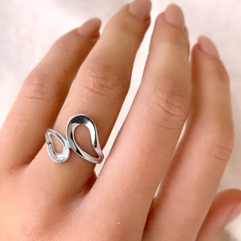 Droppe fingerringar i silver