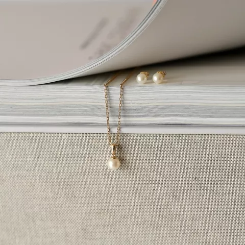 elfenbensvit pärla set med örhängen och hängen i 14 karat guld
