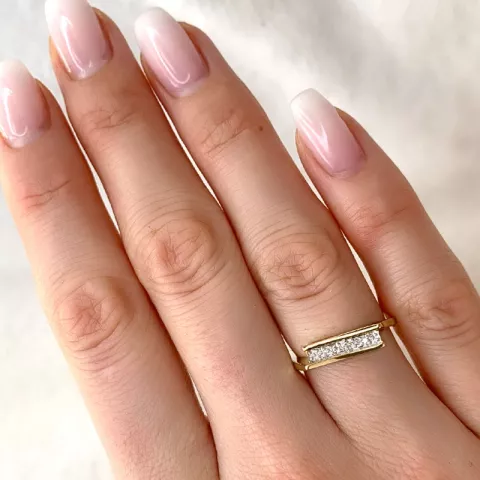 elegant abstrakt diamant ring i 9 karat guld- och vitguld 0,01 ct