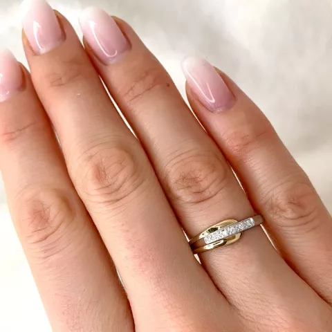 elegant abstrakt diamant ring i 9 karat guld- och vitguld 0,03 ct