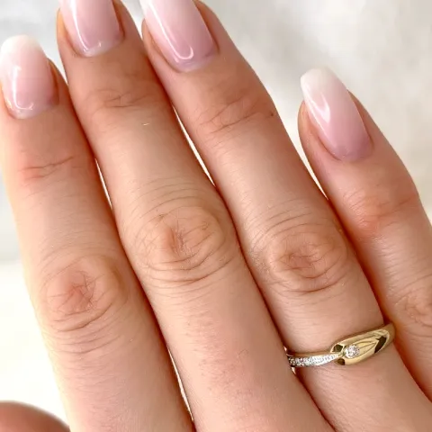äkta  abstrakt diamant ring i 9 karat guld- och vitguld 0,05 ct
