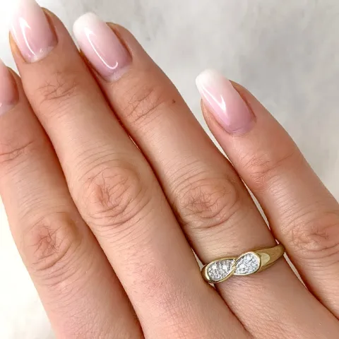 abstrakt briljantring i 9 karat guld- och vitguld 0,04 ct