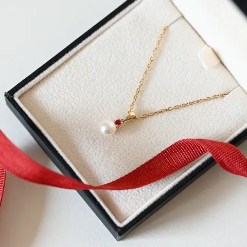 pärla hängen i 9 carat guld 0,07 ct