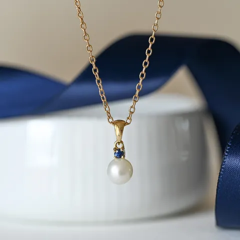 pärla hängen i 9 carat guld 0,07 ct