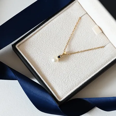pärla hängen i 9 carat guld 0,07 ct