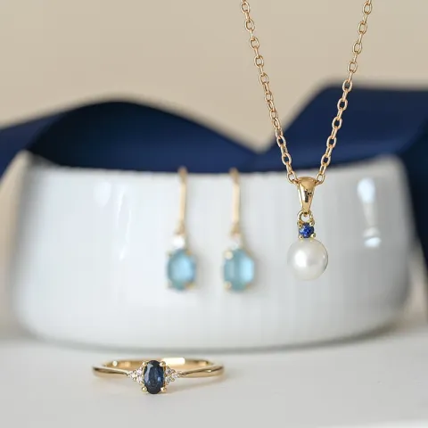 pärla hängen i 9 carat guld 0,07 ct