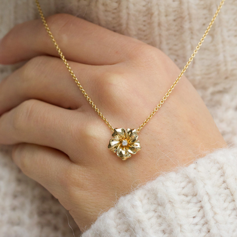 Blommor diamantberlocker i 9 carat guld 0,022 ct