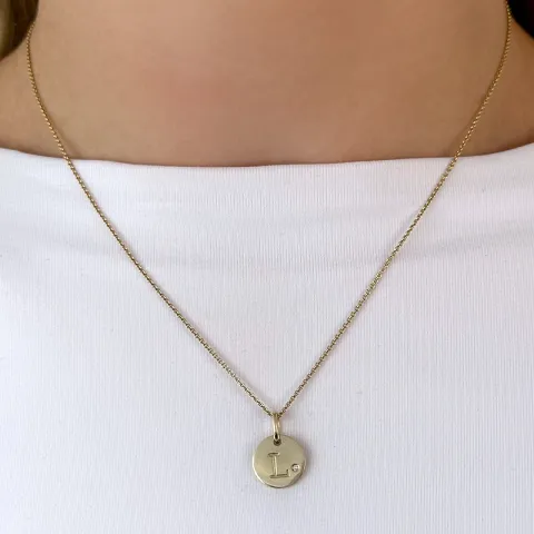 bokstav l diamant hängen i 9 carat guld 0,01 ct