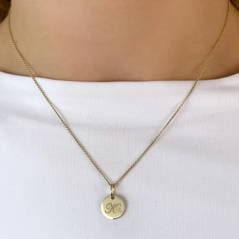 bokstav k diamant hängen i 9 carat guld 0,01 ct