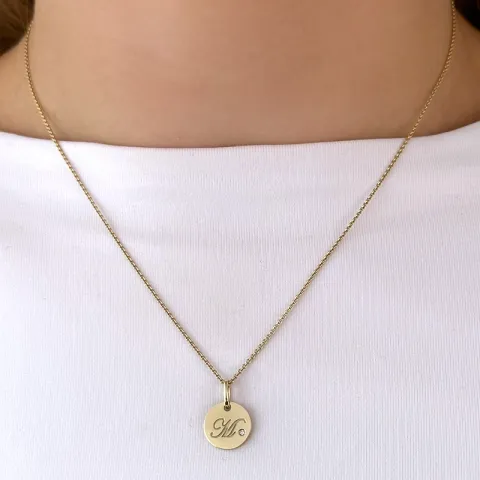bokstav m diamant hängen i 9 carat guld 0,01 ct