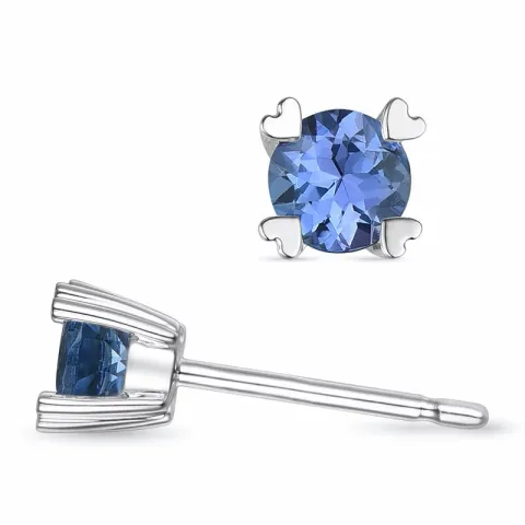 2 x 0,22 ct tanzanit solitäreörhängestift i 9 karat vitguld med tanzanit